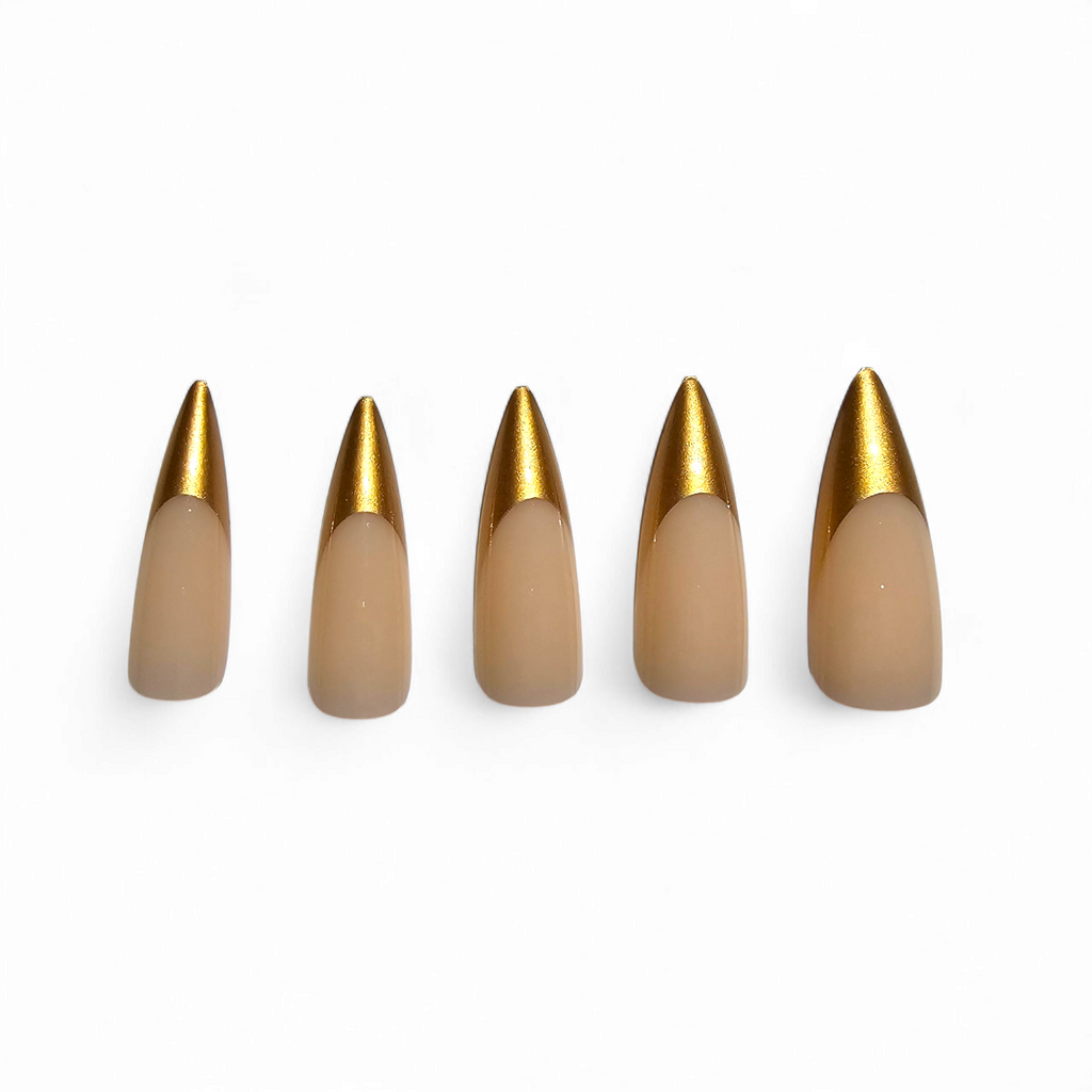 Side view of Gilded Muse press-on nails — luxury gold French tip matte nude stiletto nails