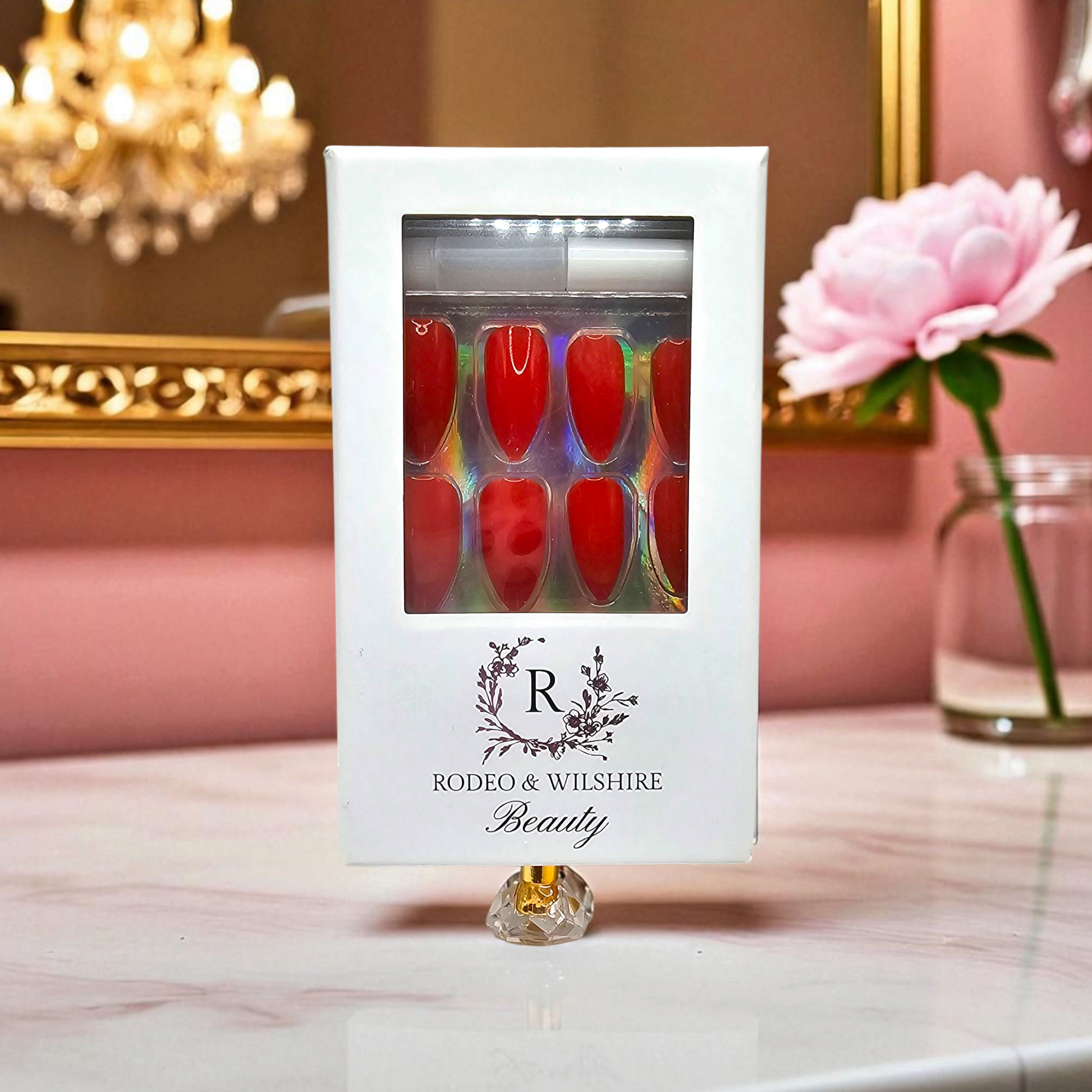 Close-up of Lady in Red almond press-ons – true red color – Rodeo & Wilshire Beauty