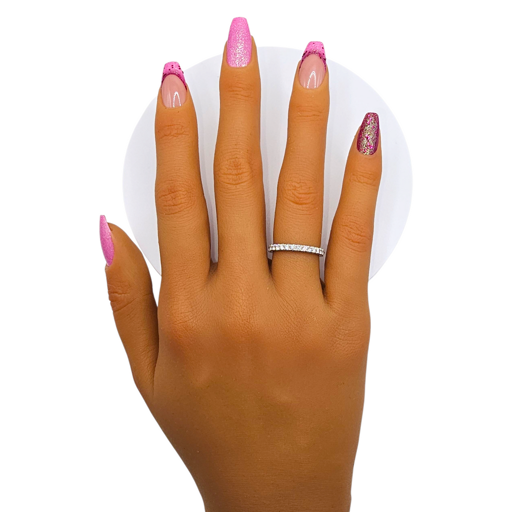 Pink Soirée press-on nails front view — short coffin pink nails with glitter accent.