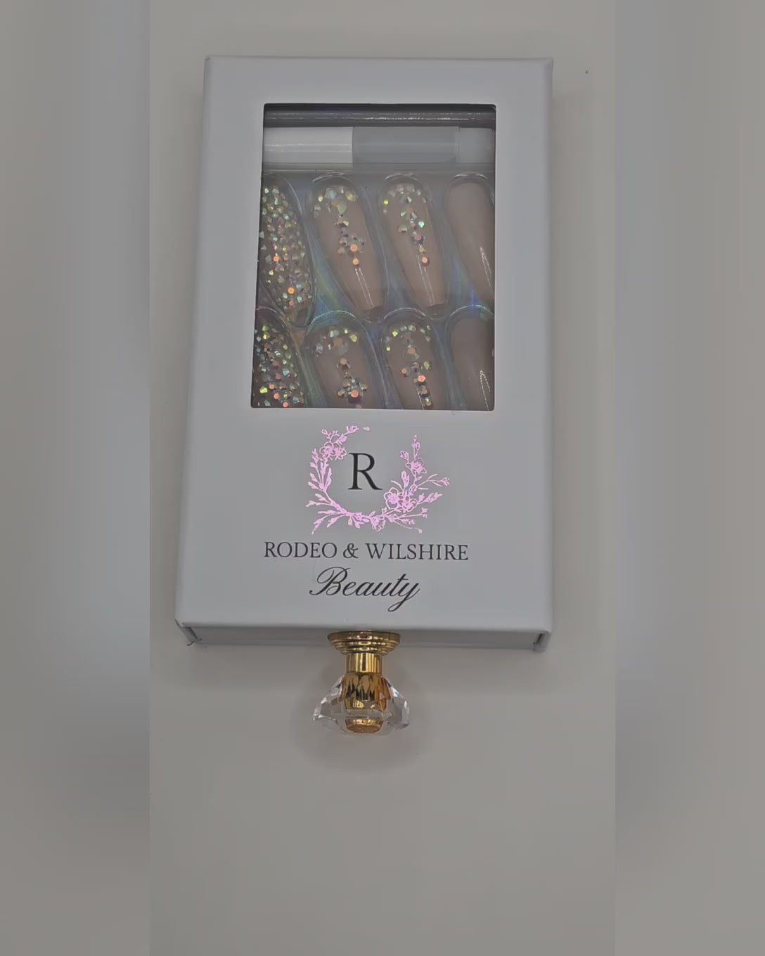 Application video showing Lady in Red classic red almond press-on nails – date night look – Rodeo & Wilshire Beauty