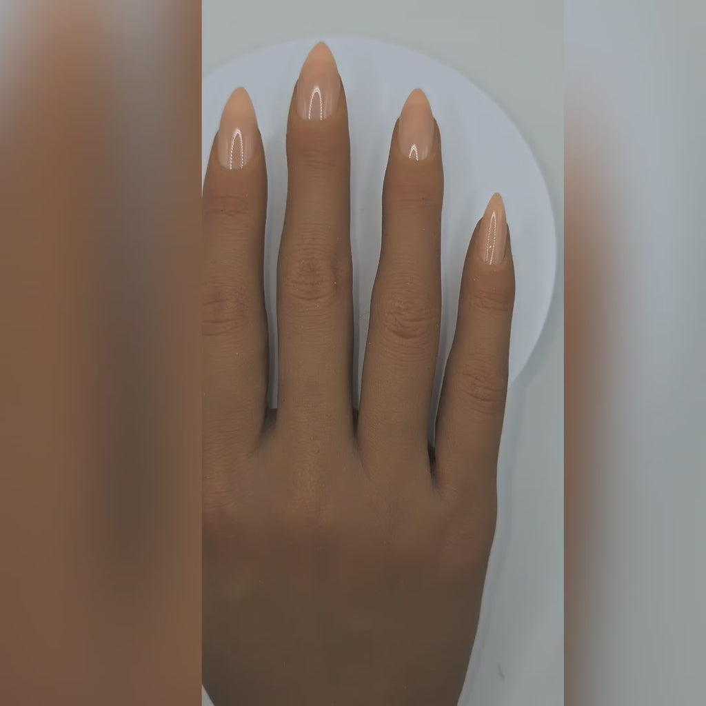 Close-up of Corporate Girlies press-ons – warm nude almond shape – Rodeo & Wilshire Beauty