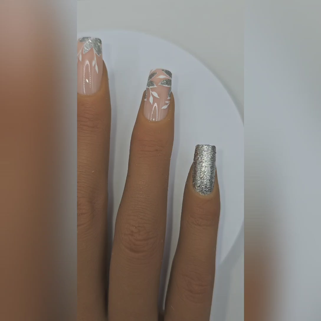 Application video showing Garden Party floral silver glitter press-on nails – Soft Girl Era styling – Rodeo & Wilshire Beauty