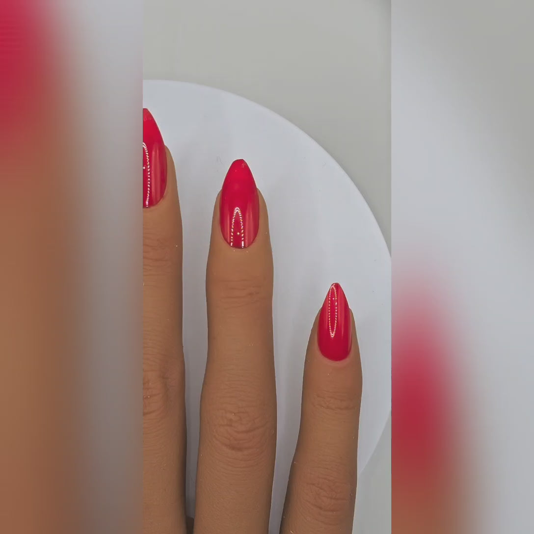 Lifestyle video of Lady in Red nails worn on a romantic dinner date – timeless red manicure – Rodeo & Wilshire Beauty