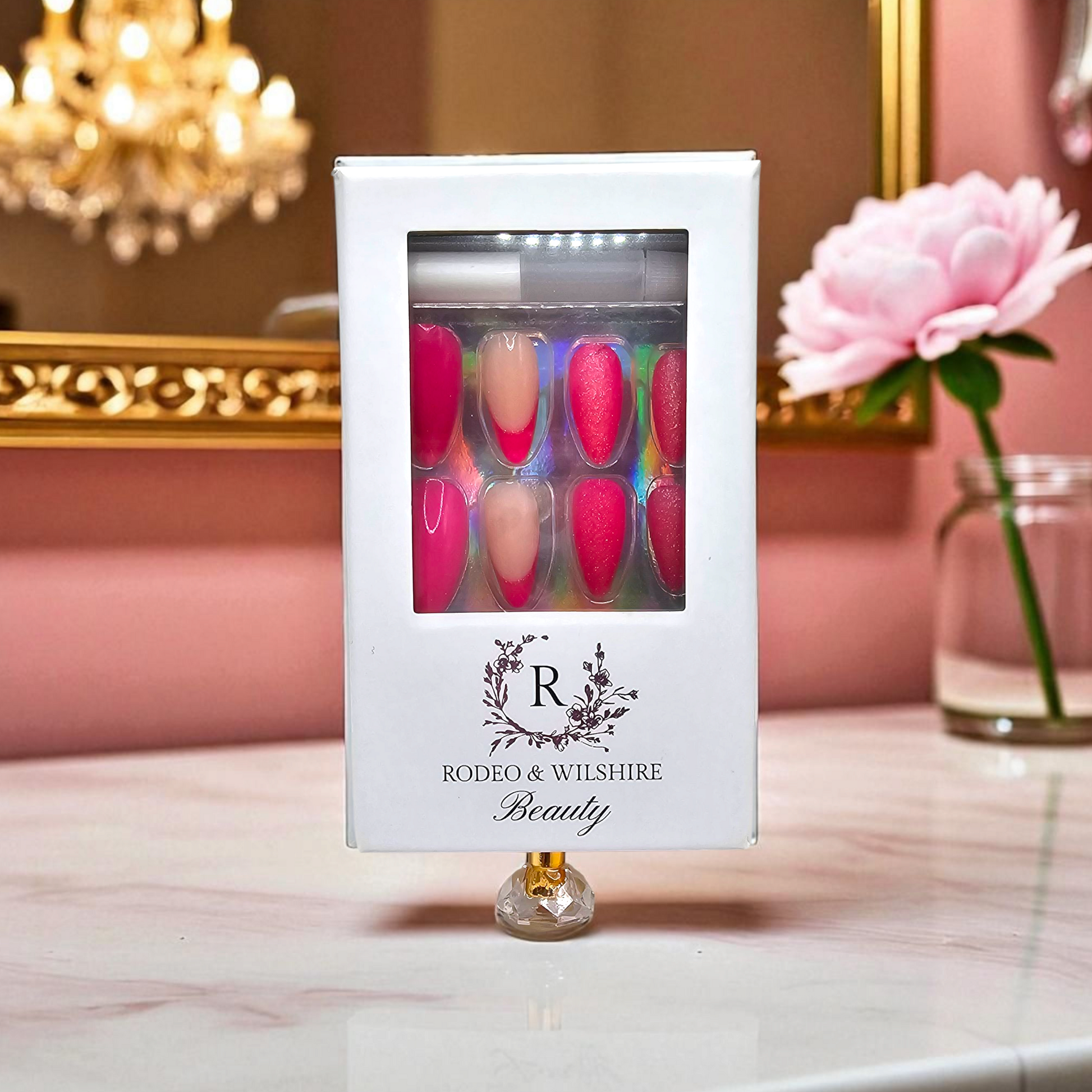 Rio Carnival press-on nails styled — party-ready pink stiletto nails for girls’ night or festival.