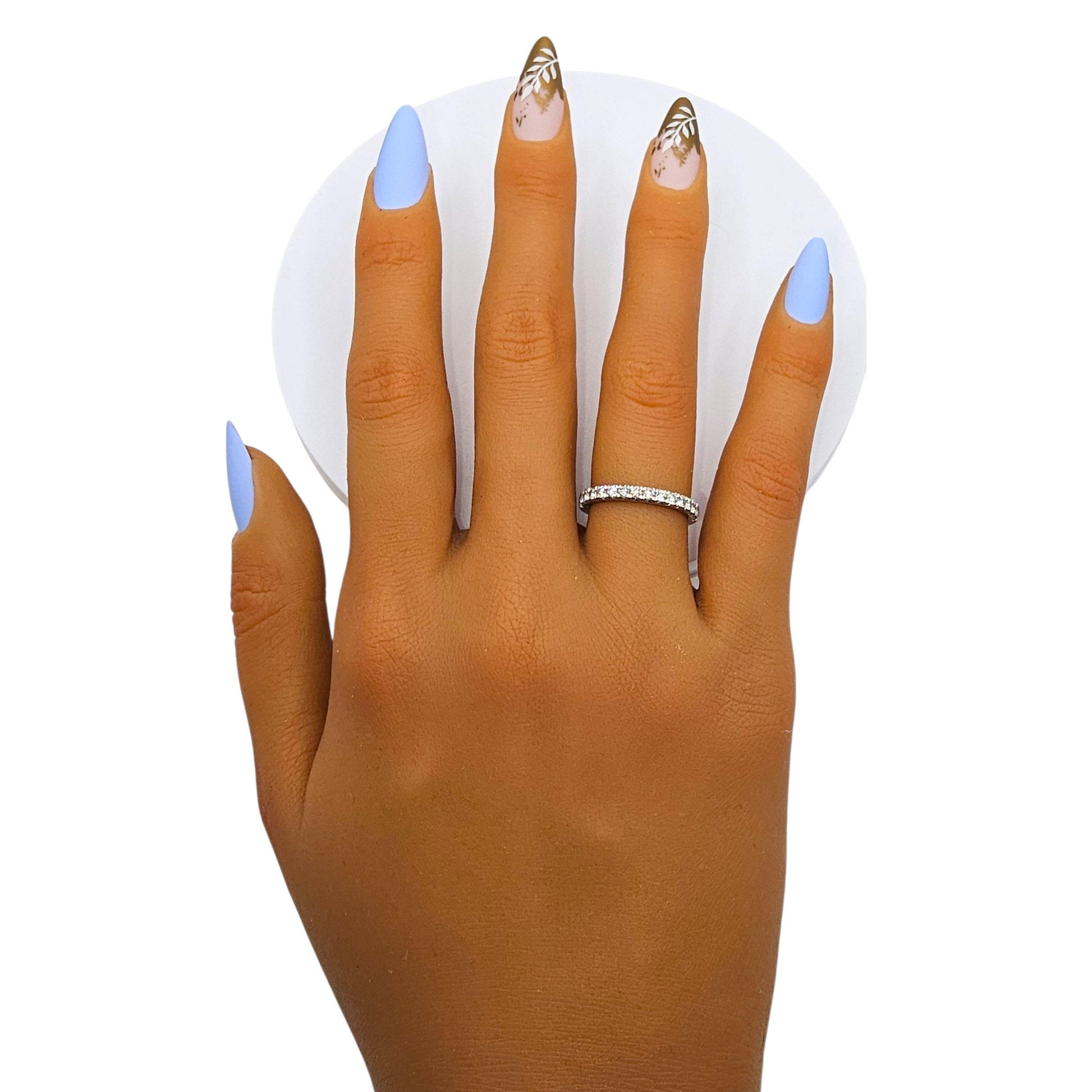 Seychelles Serenity press-on nails front view — matte periwinkle almond shape, leaf accent.